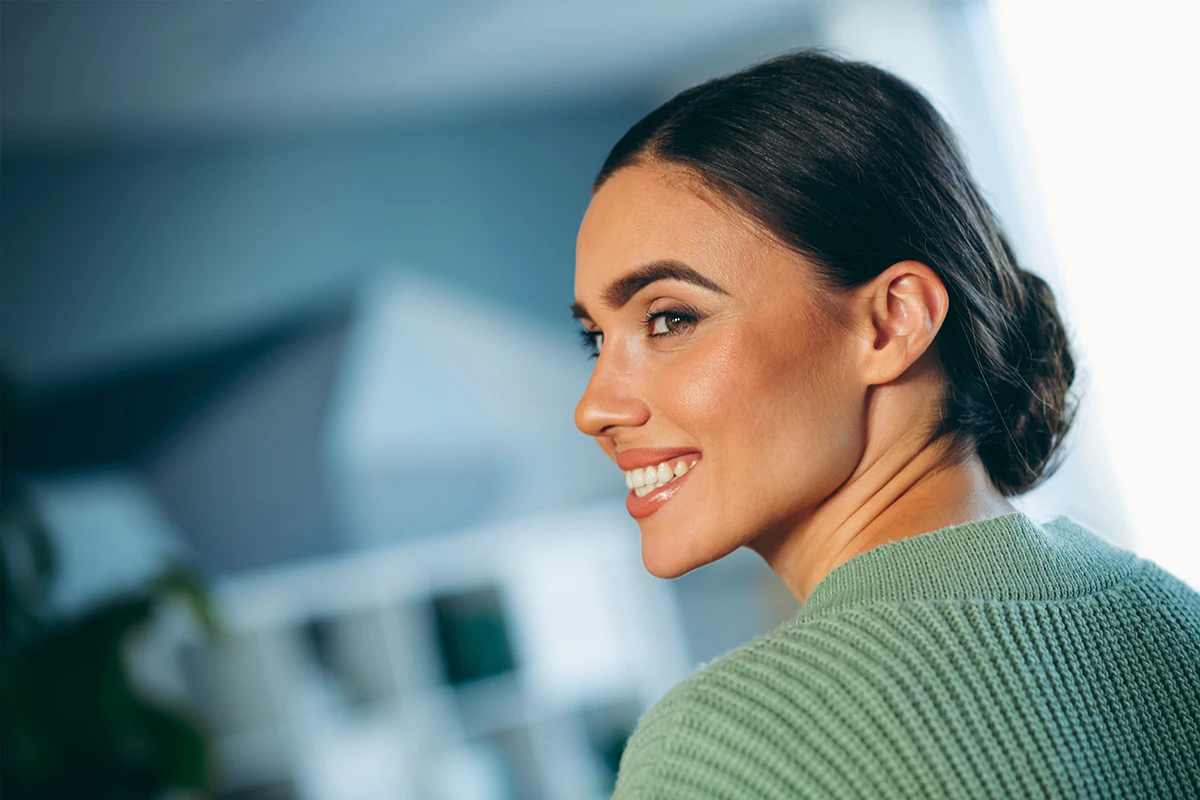 Revision rhinoplasty candidate: Close-up of woman with soft facial profile