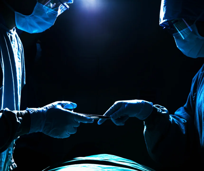 Surgeons Holding Facelift Surgery Tools